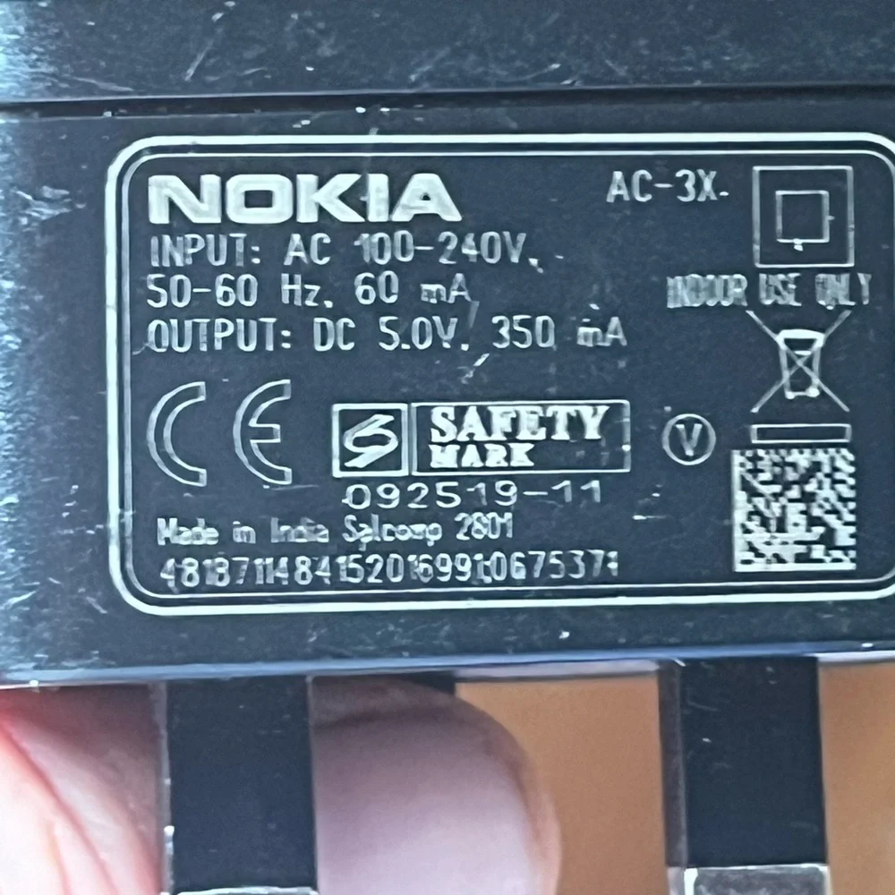 Nokia AC-3X Foreign Travel Cell Phone Charger INPUT: 100-240V AC OUTPUT: 5V DC